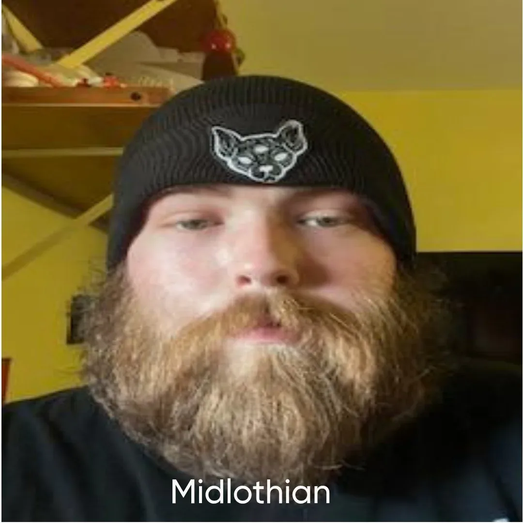 Happy Daze Midlothian team member wearing a beanie